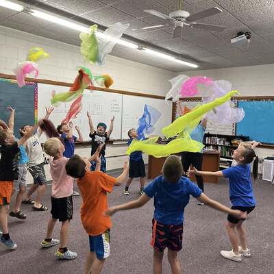 Summer number 3 we covered music and movement. Scarves show a great way to move to music.