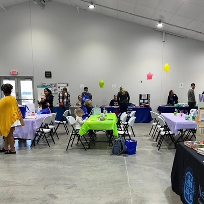 Our 2025 shower held in Seneca, which included 12 vendors and served over 60 families.