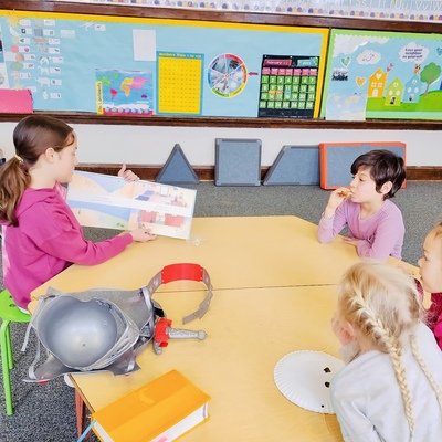 Older students read to the younger students daily.