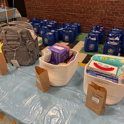 Gift bags ready for families who participate in the 2026 shower, as well as some raffle prizes