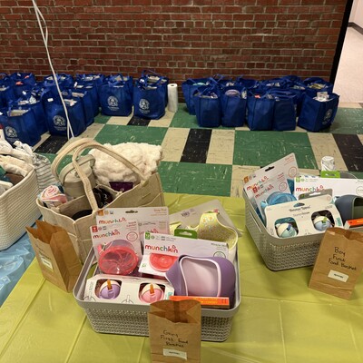 Gift bags ready for families who participate in the 2026 shower, as well as some raffle prizes